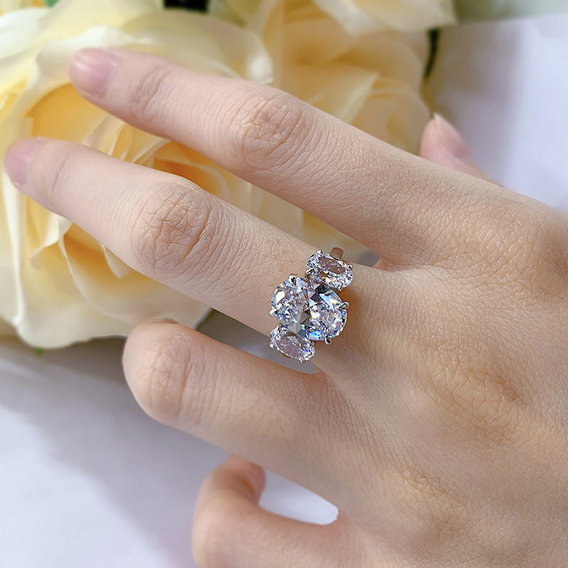 Urqanyu S925 silver oval four-claw support diamond three cubic zirconia engagement ring 8*11
