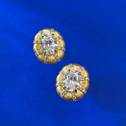 Urqanyu S925 silver gold-plated fashionable Italian brushed craft 1.5 carat pigeon egg cubic zirconia earrings