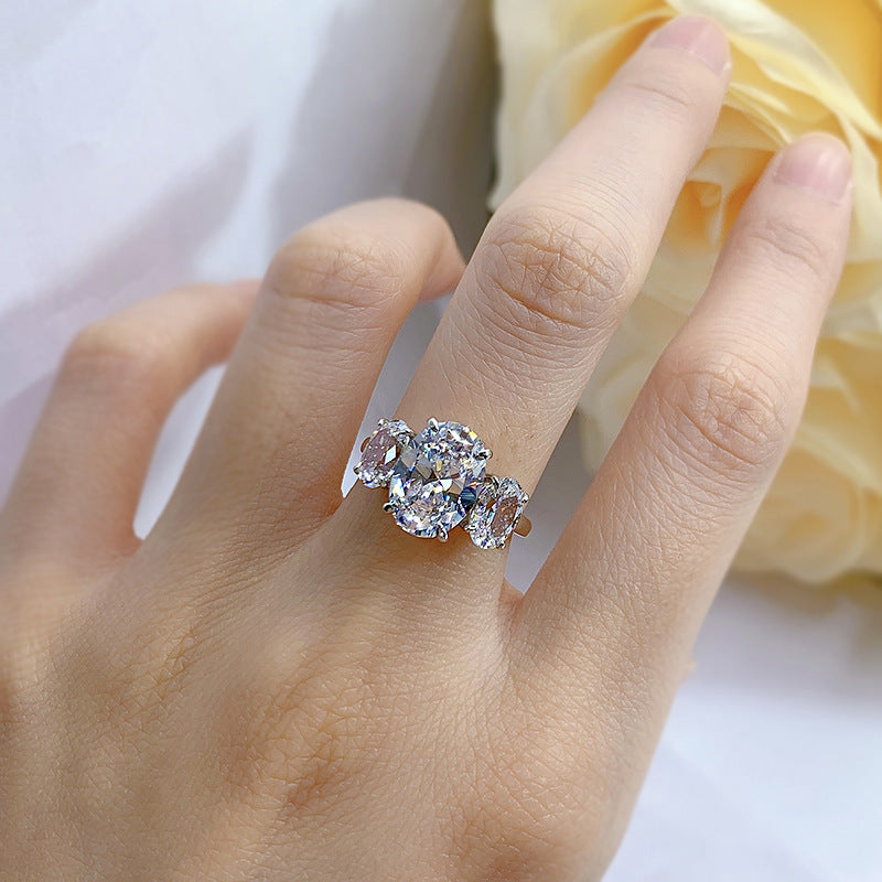 Urqanyu S925 silver oval four-claw support diamond three cubic zirconia engagement ring 8*11