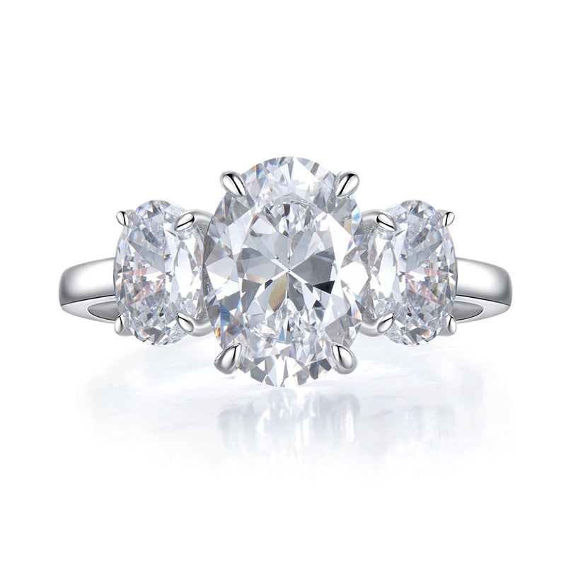 Urqanyu S925 silver oval four-claw support diamond three cubic zirconia engagement ring 8*11