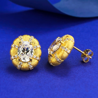 Urqanyu S925 silver gold-plated fashionable Italian brushed craft 1.5 carat pigeon egg cubic zirconia earrings