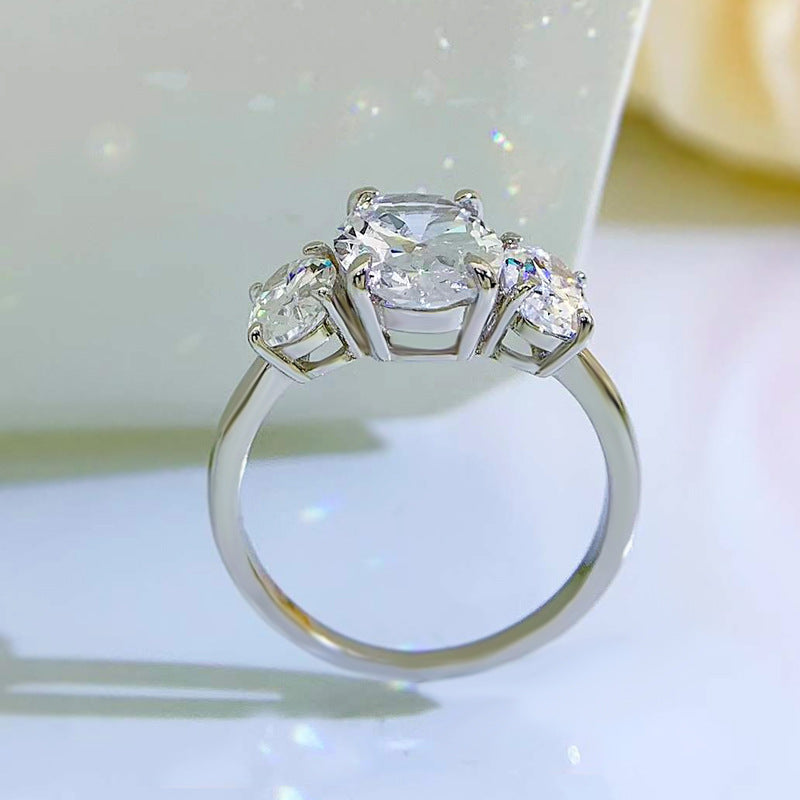 Urqanyu S925 silver oval four-claw support diamond three cubic zirconia engagement ring 8*11