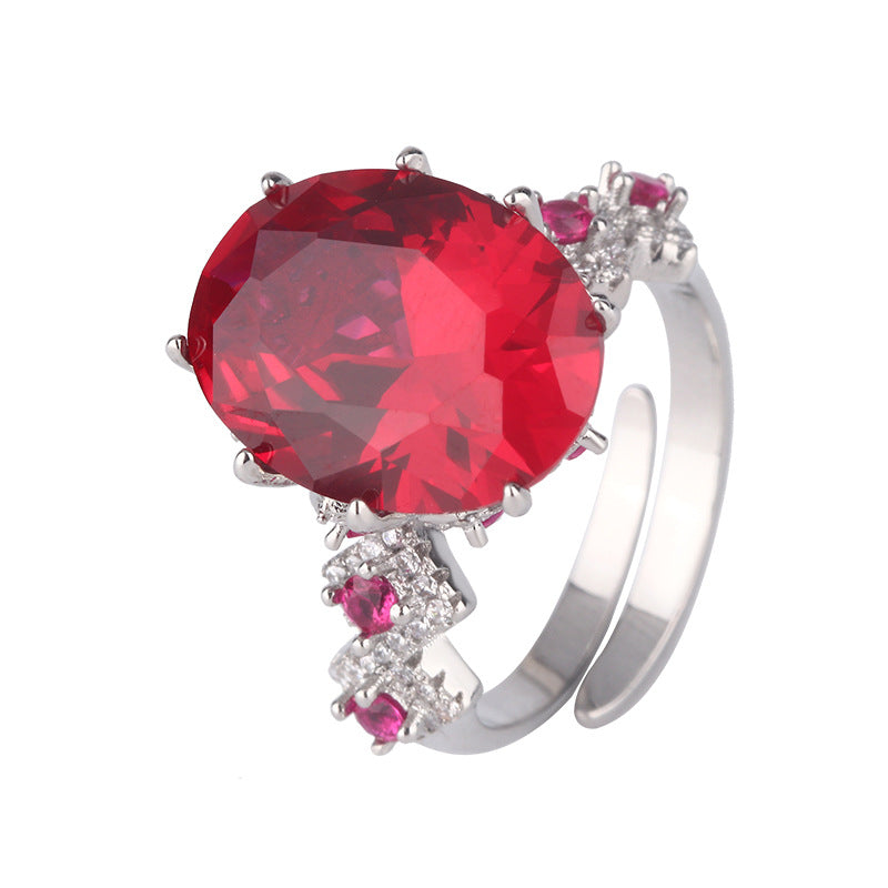 Urqanyu copper base gold-plated simulated colored gem corundum egg-shaped jump color creative cubic zirconia ring