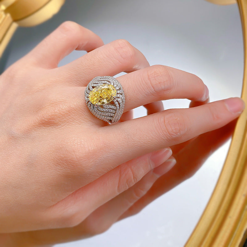 Urqanyu S925 silver egg-shaped vivid yellow ice flower cut cubic zirconia diamond ring 8*12