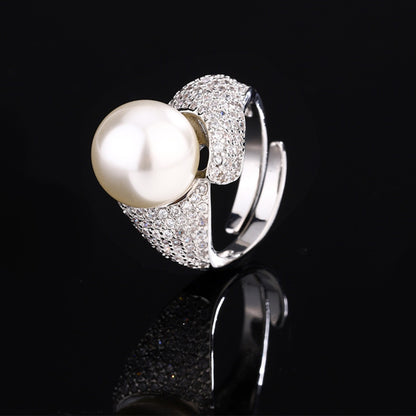 Urqanyu Copper plated white gold inlaid pearls elegant simple cubic zirconia ring 14mm